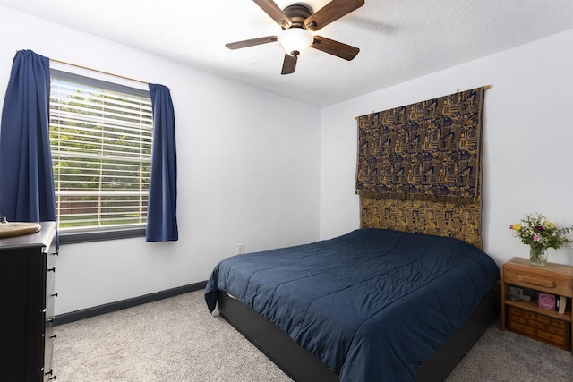 418 E Cedar Bayou Lynchburg Rd, Baytown, TX 77521 - carpeted bedroom with multiple windows and a ceiling fan