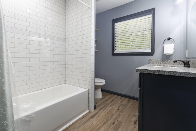 418 E Cedar Bayou Lynchburg Rd, Baytown, TX 77521 - bathroom featuring wood finished floors, vanity, and shower / bathtub combination with curtain