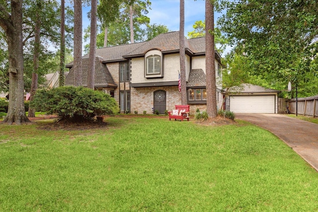 14615 Sunny Grove Dr, Houston, TX 77070 - view of front of house featuring stucco siding, concrete driveway, brick siding, a shingled roof, and an attached garage