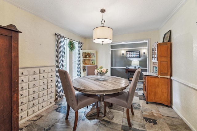 14615 Sunny Grove Dr, Houston, TX 77070 - dining space featuring light stone finish flooring and crown molding