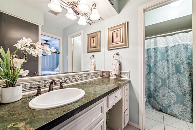14615 Sunny Grove Dr, Houston, TX 77070 - full bath featuring vanity, a chandelier, tile patterned floors, and curtained shower