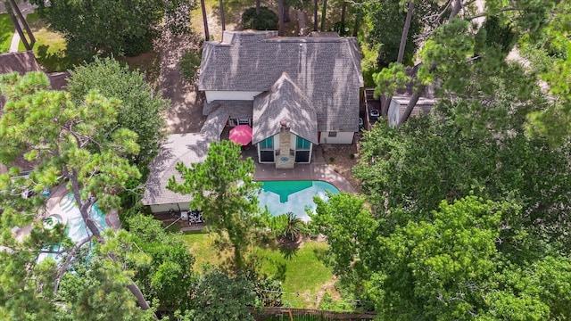 14615 Sunny Grove Dr, Houston, TX 77070 - view from above of property featuring a pool and a tree filled landscape