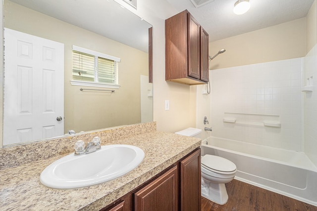 12006 Gregory Crossing Way, Houston, TX 77067 - bathroom featuring vanity, shower / tub combination, and wood finished floors