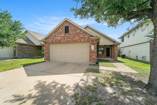12006 Gregory Crossing Way, Houston, TX 77067 - view of front of home featuring brick siding, concrete driveway, and an attached garage