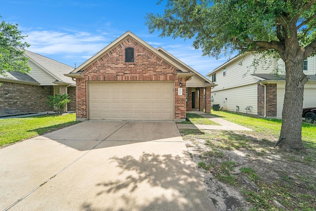 12006 Gregory Crossing Way, Houston, TX 77067 - view of front facade featuring brick siding, concrete driveway, an attached garage, and a front yard