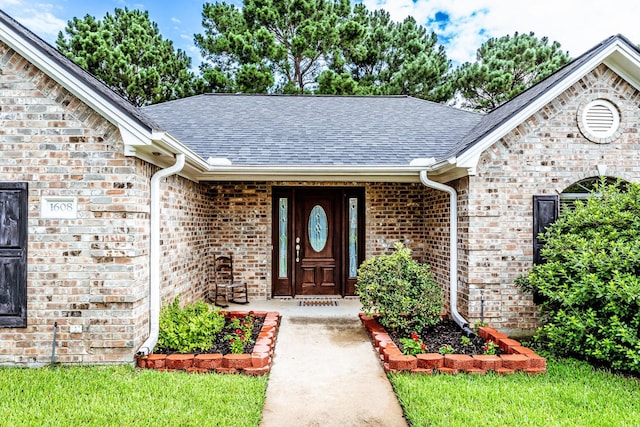 1608 Durham Dr, Huntsville, TX 77340 - entrance to property with brick siding and roof with shingles