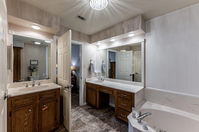 1608 Durham Dr, Huntsville, TX 77340 - full bathroom featuring vanity and a tub with jets