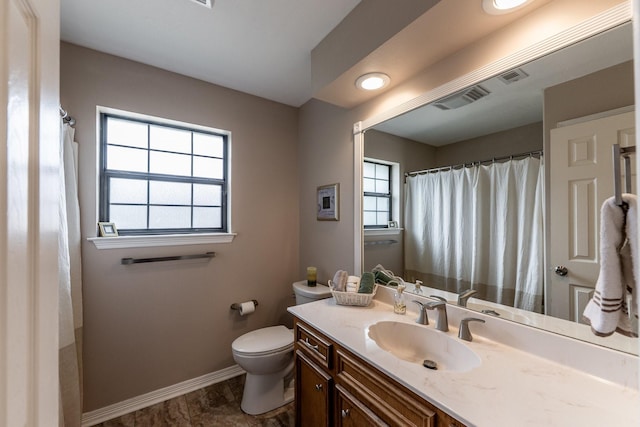 1608 Durham Dr, Huntsville, TX 77340 - bathroom featuring baseboards and vanity