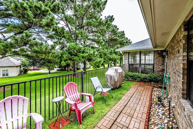 1608 Durham Dr, Huntsville, TX 77340 - view of patio / terrace with a grill