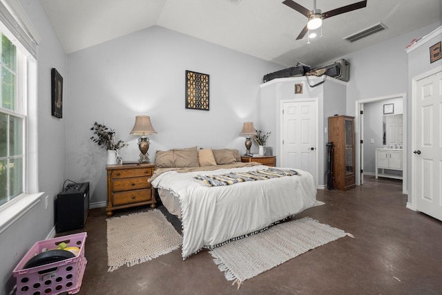 683 Cross Timbers, Livingston, TX 77351 - bedroom with lofted ceiling, concrete flooring, multiple windows, and ceiling fan