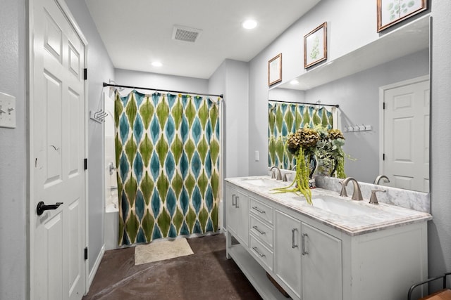 683 Cross Timbers, Livingston, TX 77351 - bathroom with concrete flooring, double vanity, curtained shower, and recessed lighting