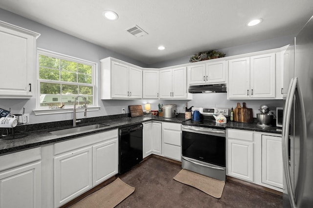 683 Cross Timbers, Livingston, TX 77351 - kitchen with appliances with stainless steel finishes, under cabinet range hood, concrete floors, white cabinets, and recessed lighting