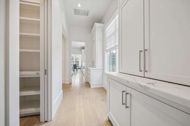 6626 Westchester Ave, West University Place, TX 77005 - corridor featuring light wood-type flooring and recessed lighting