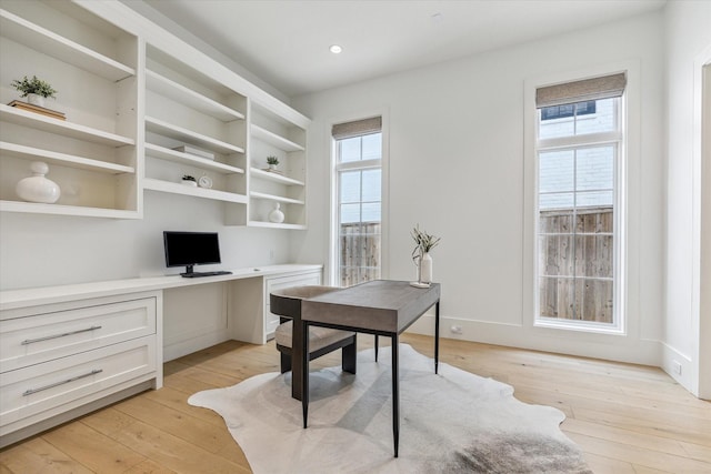 6626 Westchester Ave, West University Place, TX 77005 - office featuring built in study area, light wood finished floors, and recessed lighting