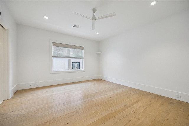 6626 Westchester Ave, West University Place, TX 77005 - spare room with ceiling fan, light wood finished floors, and recessed lighting