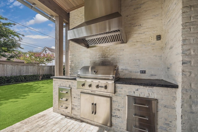 6626 Westchester Ave, West University Place, TX 77005 - view of patio / terrace with an outdoor kitchen
