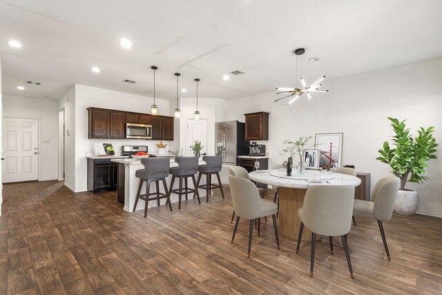 5122 Moonlit Garden Ln, Katy, TX 77449 - dining space featuring dark wood finished floors and recessed lighting