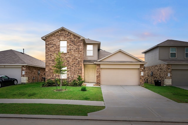 5122 Moonlit Garden Ln, Katy, TX 77449 - traditional-style home with a front yard, concrete driveway, an attached garage, and brick siding