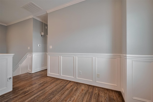 2106 Bidwell Dr, Houston, TX 77018 - empty room featuring dark wood-style floors, ornamental molding, a decorative wall, and wainscoting