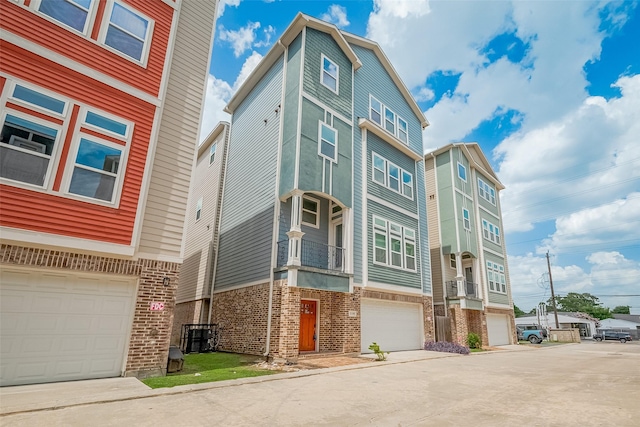 2106 Bidwell Dr, Houston, TX 77018 - view of building exterior with a garage and concrete driveway