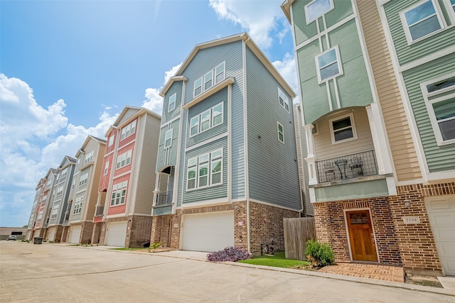 2106 Bidwell Dr, Houston, TX 77018 - view of building exterior featuring a garage and concrete driveway