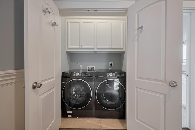 2106 Bidwell Dr, Houston, TX 77018 - laundry room with independent washer and dryer and cabinet space