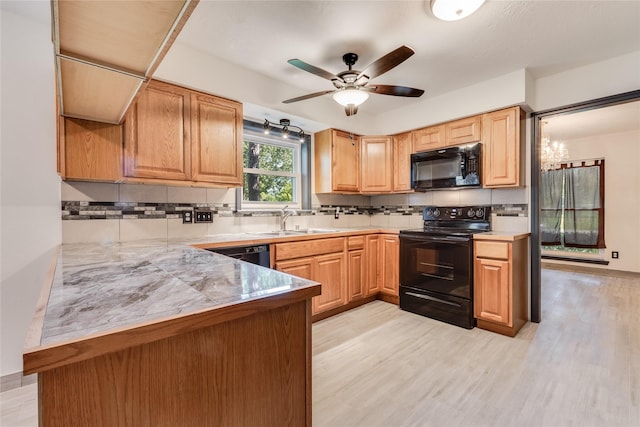 2004 Sleepy Hollow Dr, Pearland, TX 77581 - kitchen featuring black appliances, backsplash, light wood-style floors, ceiling fan, and light countertops