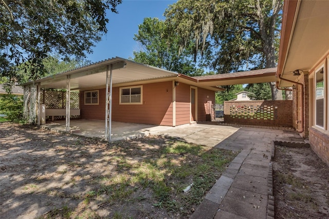 2004 Sleepy Hollow Dr, Pearland, TX 77581 - rear view of house with a patio
