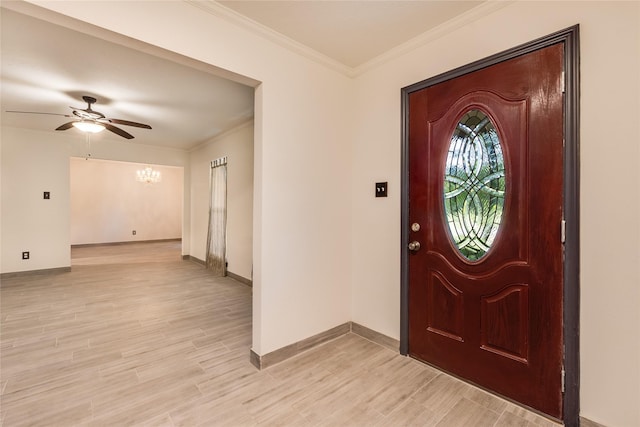 2004 Sleepy Hollow Dr, Pearland, TX 77581 - entrance foyer with light wood-type flooring, a ceiling fan, ornamental molding, and a chandelier