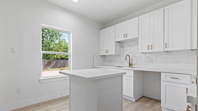 1719 Esther St B, Unit A, Houston, TX 77088 - kitchen featuring plenty of natural light, light countertops, light wood finished floors, and recessed lighting