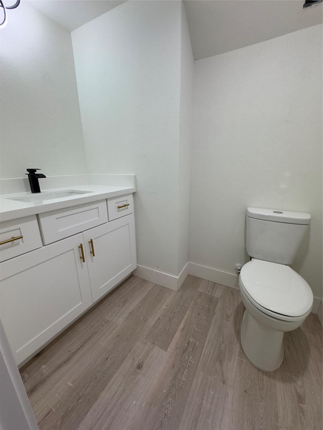 1719 Esther St B, Unit A, Houston, TX 77088 - half bath featuring vanity and wood finished floors