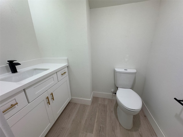 1719 Esther St B, Unit A, Houston, TX 77088 - half bathroom featuring vanity and wood finished floors