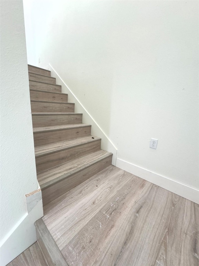 1719 Esther St B, Unit A, Houston, TX 77088 - stairs with wood finished floors