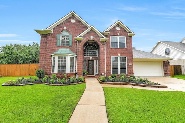 17422 Sunset Arbor Dr, Tomball, TX 77377 - traditional-style home with brick siding, concrete driveway, and an attached garage