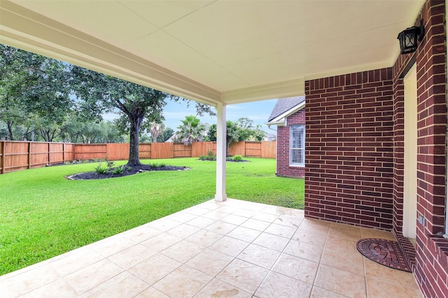 17422 Sunset Arbor Dr, Tomball, TX 77377 - fenced backyard with a patio area