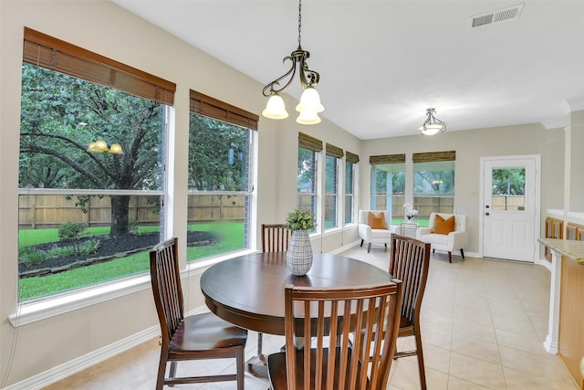 17422 Sunset Arbor Dr, Tomball, TX 77377 - sunroom / solarium with tile patterned floors and a chandelier