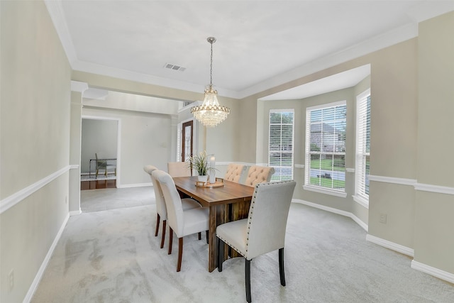 17422 Sunset Arbor Dr, Tomball, TX 77377 - dining area featuring light carpet, a chandelier, and ornamental molding