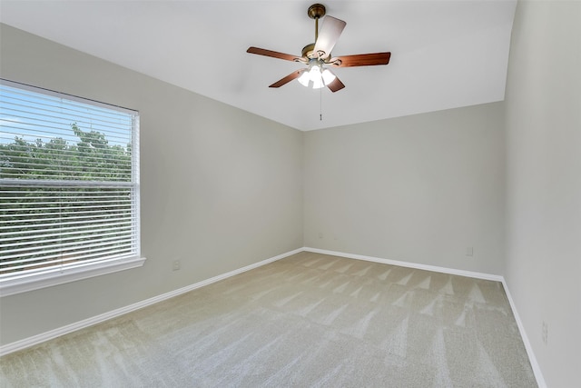 17422 Sunset Arbor Dr, Tomball, TX 77377 - carpeted empty room with baseboards and a ceiling fan