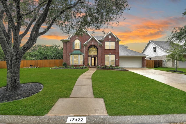 17422 Sunset Arbor Dr, Tomball, TX 77377 - traditional home featuring brick siding, driveway, and a garage