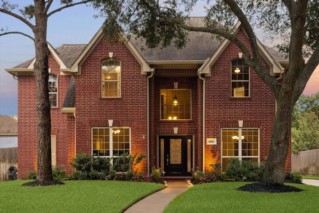 1611 Barrington Hills Ln, Katy, TX 77450 - view of front facade featuring brick siding and a shingled roof