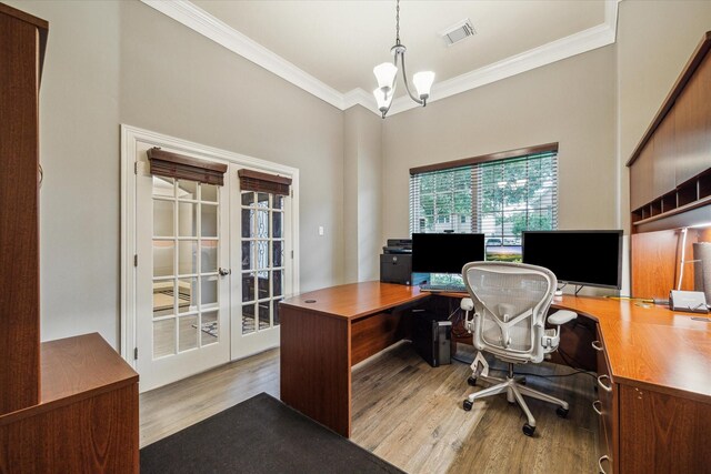 1611 Barrington Hills Ln, Katy, TX 77450 - office featuring crown molding, wood finished floors, a chandelier, and french doors