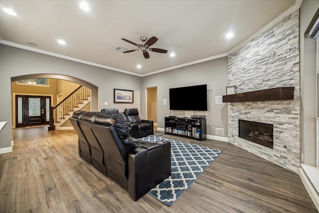 1611 Barrington Hills Ln, Katy, TX 77450 - living area with a ceiling fan, arched walkways, wood finished floors, recessed lighting, and stairway