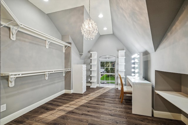 1611 Barrington Hills Ln, Katy, TX 77450 - walk in closet featuring dark wood-style flooring, vaulted ceiling, and a chandelier