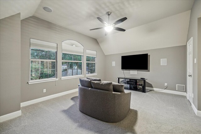 1611 Barrington Hills Ln, Katy, TX 77450 - living room with vaulted ceiling, carpet, a ceiling fan, and healthy amount of natural light