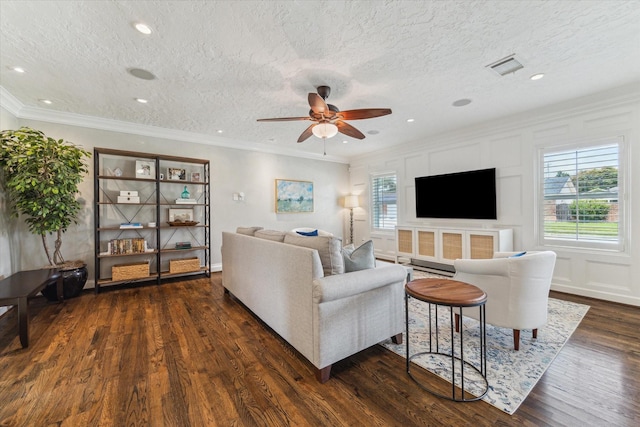 2603 Haverhill Dr, Houston, TX 77008 - living room featuring dark wood-style floors, a ceiling fan, crown molding, recessed lighting, and a textured ceiling