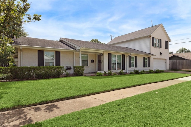 2603 Haverhill Dr, Houston, TX 77008 - view of front of home featuring an attached garage, a front lawn, and a shingled roof