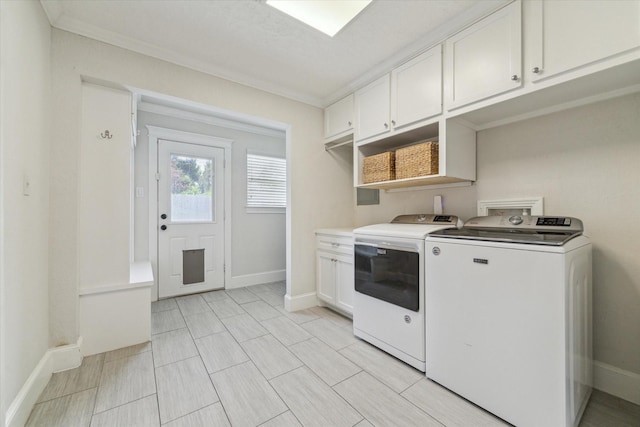 2603 Haverhill Dr, Houston, TX 77008 - laundry room featuring cabinet space, independent washer and dryer, and crown molding