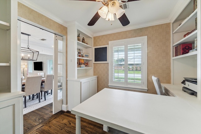 2603 Haverhill Dr, Houston, TX 77008 - home office featuring wallpapered walls, ornamental molding, dark wood-style flooring, a chandelier, and a ceiling fan