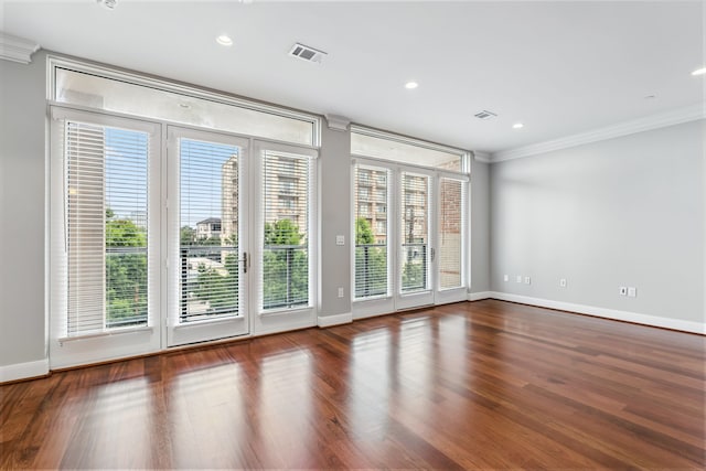 1419 Montrose Blvd Unit 301, Houston, TX 77019 - unfurnished room featuring crown molding, wood finished floors, and recessed lighting