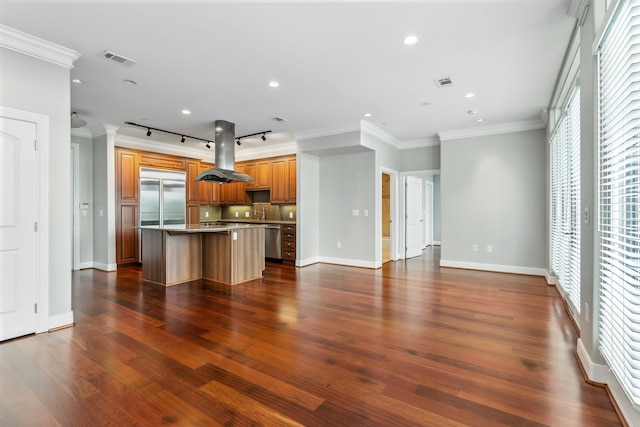1419 Montrose Blvd Unit 301, Houston, TX 77019 - unfurnished living room featuring dark wood-type flooring, crown molding, and recessed lighting